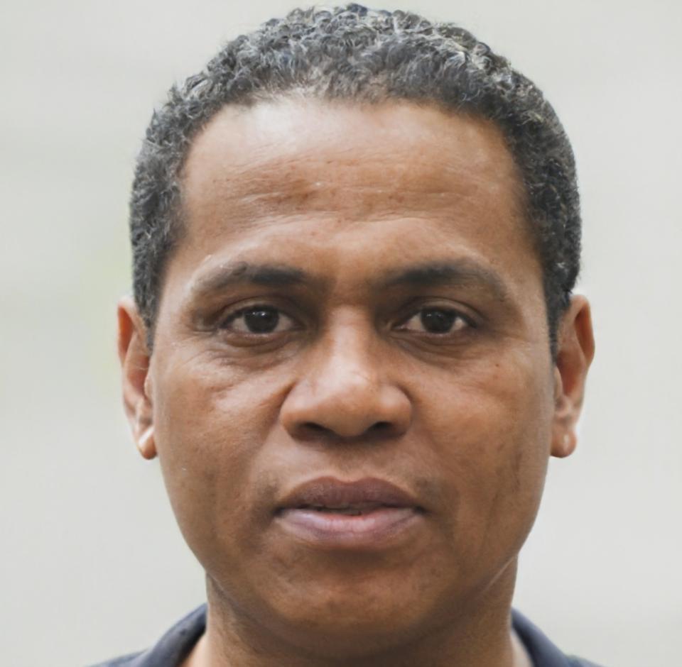 Professional headshot of program graduate